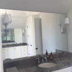 Hazy view of grey and marble bathroom