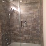 Tub and shower combo with glass sliding door