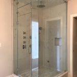Corner shower with mosaic tiles